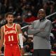 Trae Young et Nate McMillan lors d'un match des Hawks